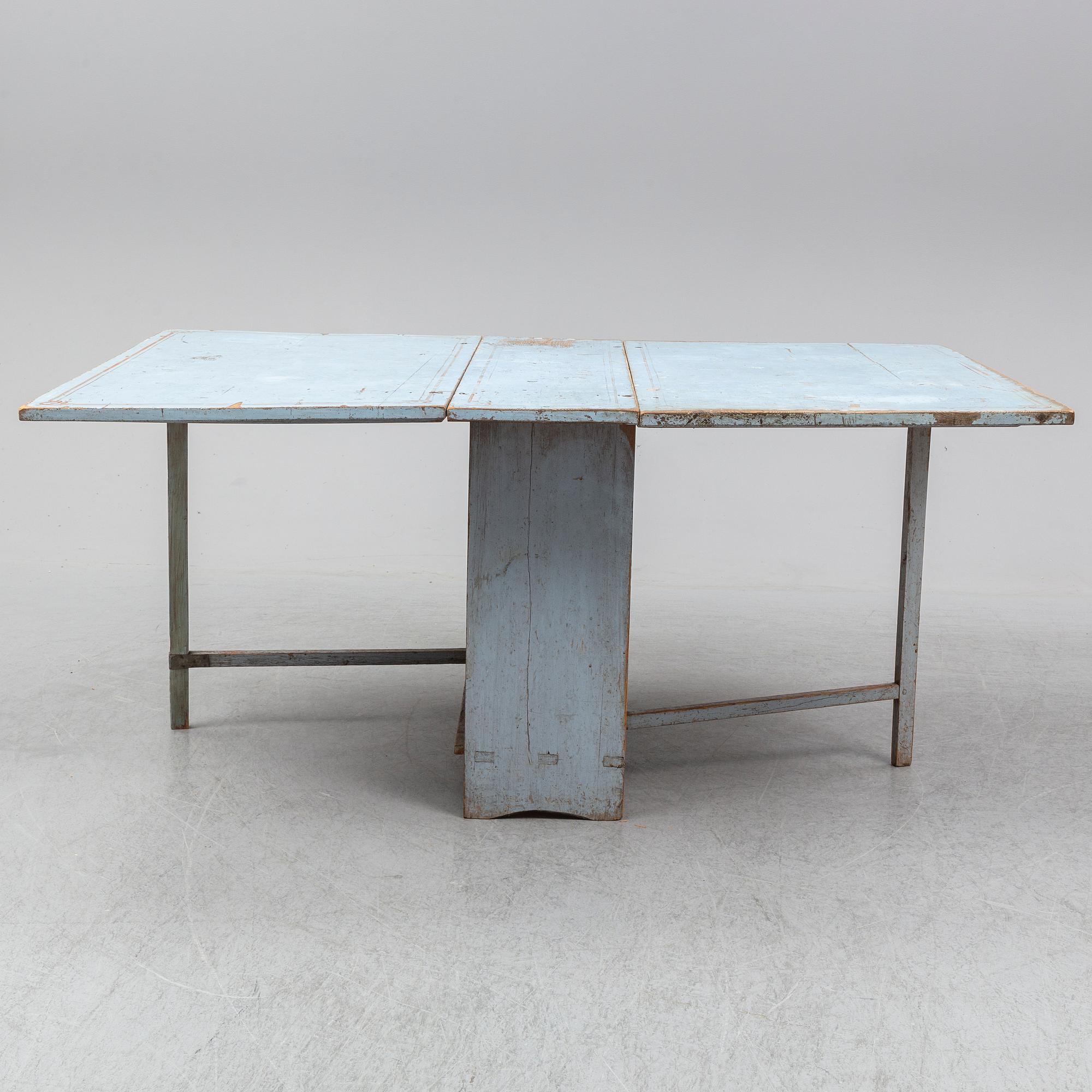 A 18th Century painted gate leg table.