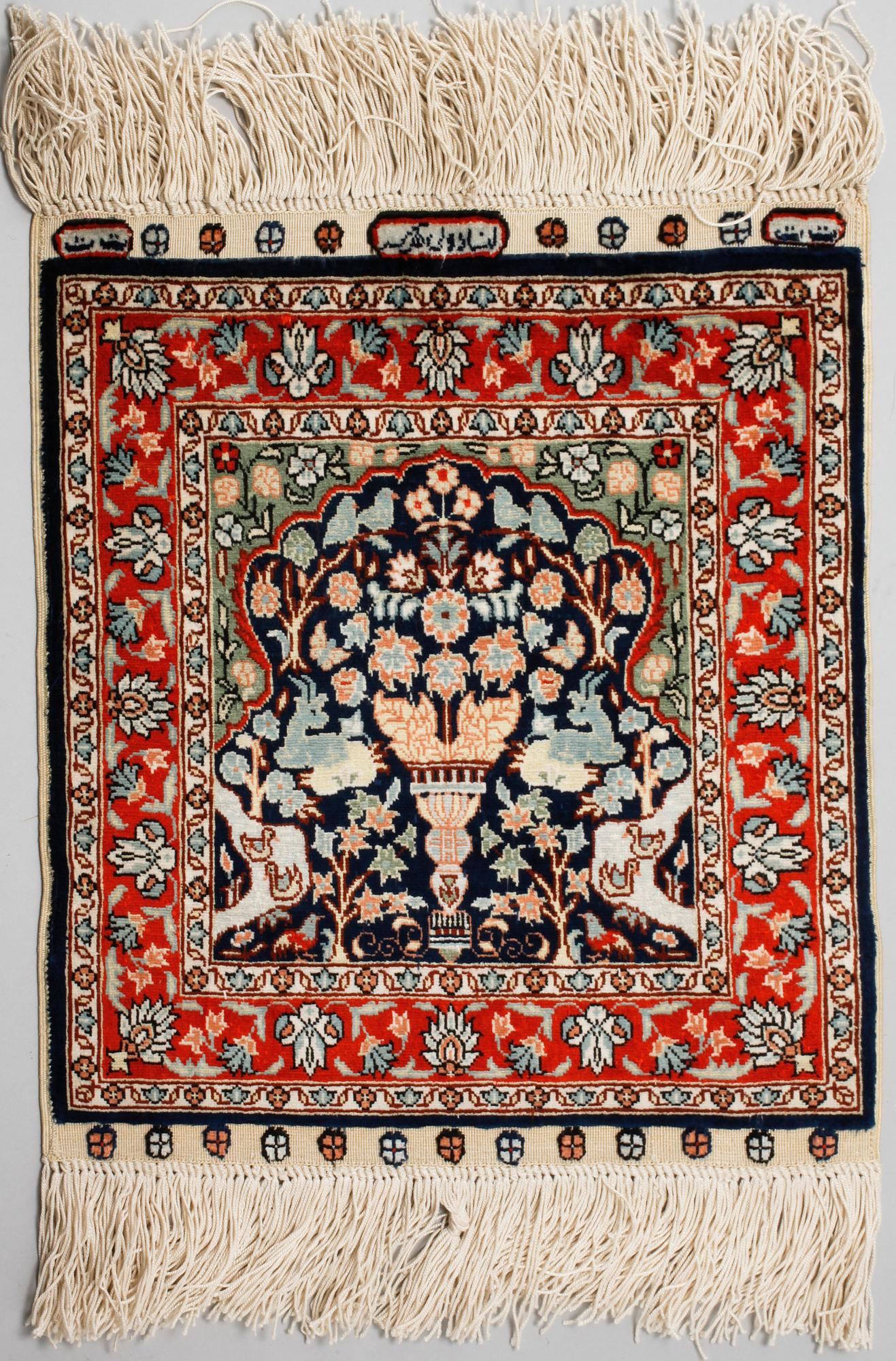 Four silk rugs/pads, probably Hereke, ca 33 x 33 cm.