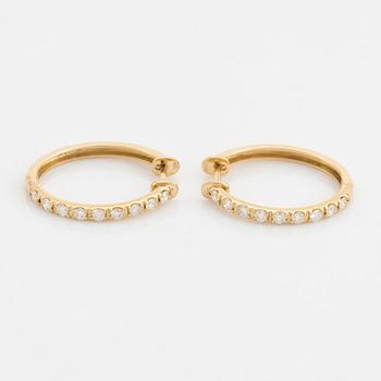 Brilliant cut diamond hoop earrings.
