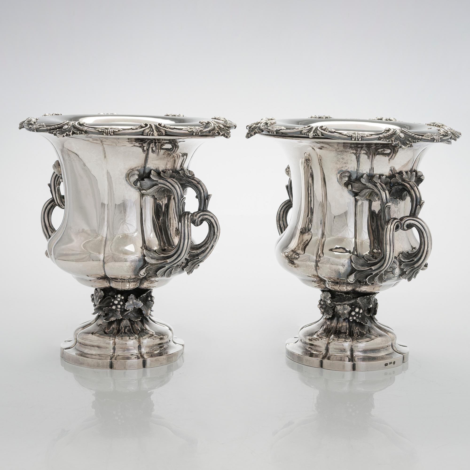 Carl Johan Tegelsten, A pair of Neo-Rococo silver champagne coolers/ vases, maker's mark of Carl Johan Tegelsten, Saint Petersburg 1849.