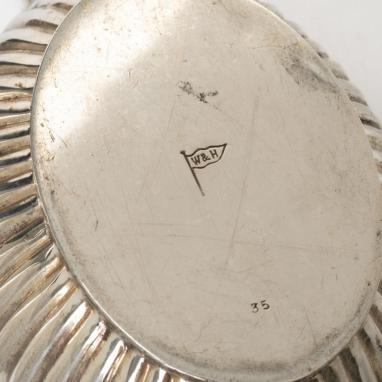 An English silver teapot, mark of Walker & Hall (John Edward Bingham), Sheffield, 1886.
