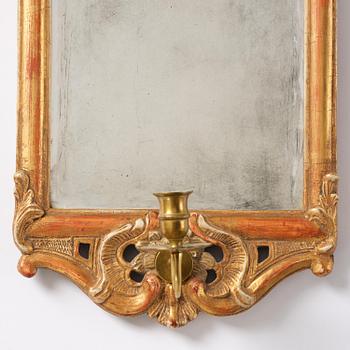 A pair of giltwood one-branch girandole mirrors by JP Larsson.