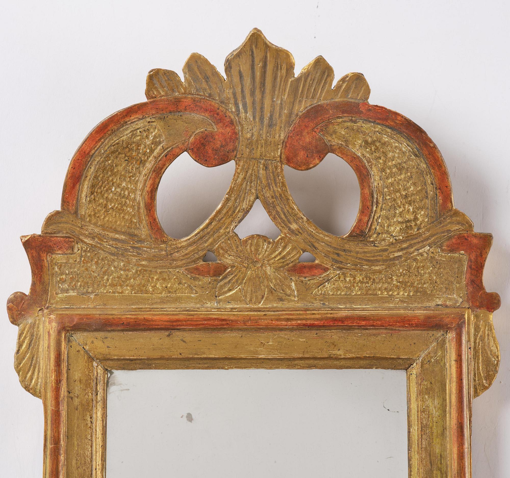 A pair of Gustavian giltwood mirrors by N. Falkengren (master in Jönköping 1776-1813).