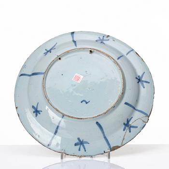 A Dutch faience dinner plate, late 17th Century.