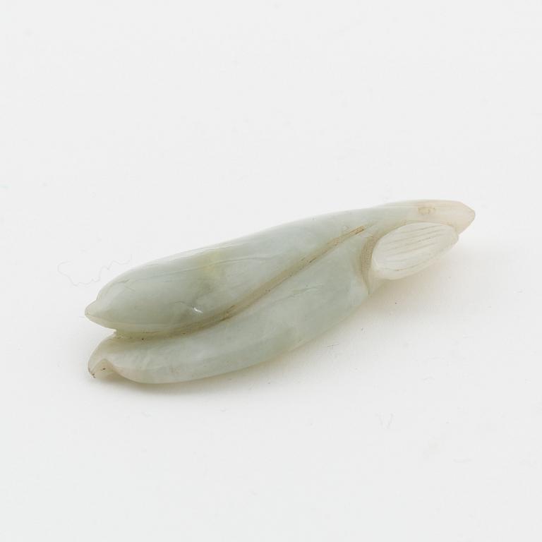 A carved nephrite pendant, China, 20th Century.