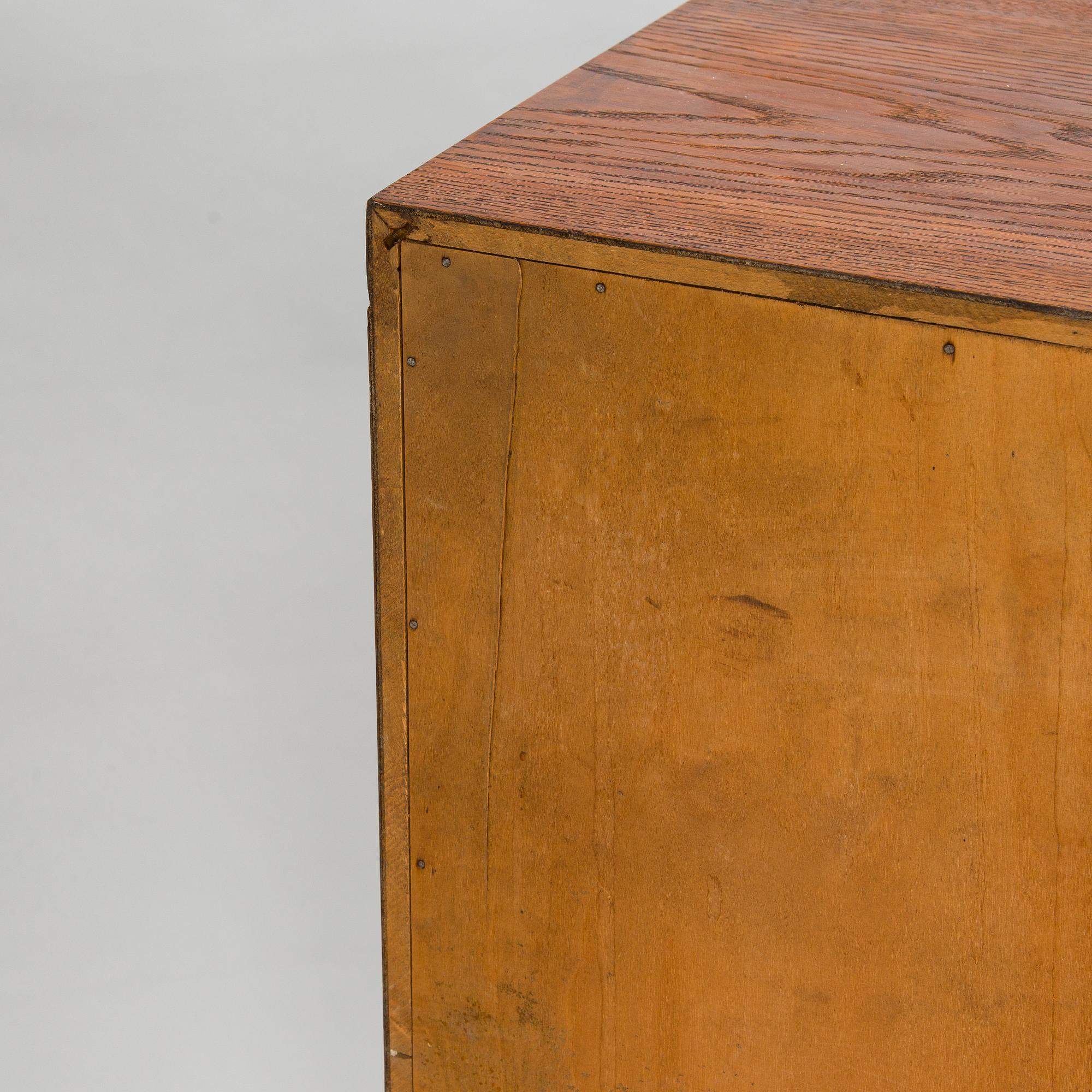 A 1930s functionalist style sideboard.