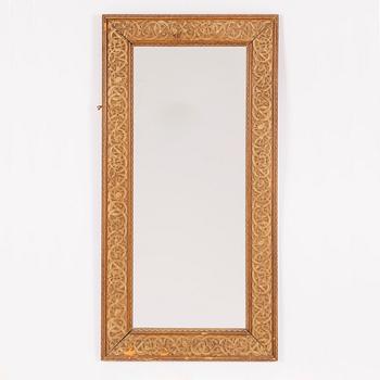 Mirror in ancient Nordic style, circa 1900.