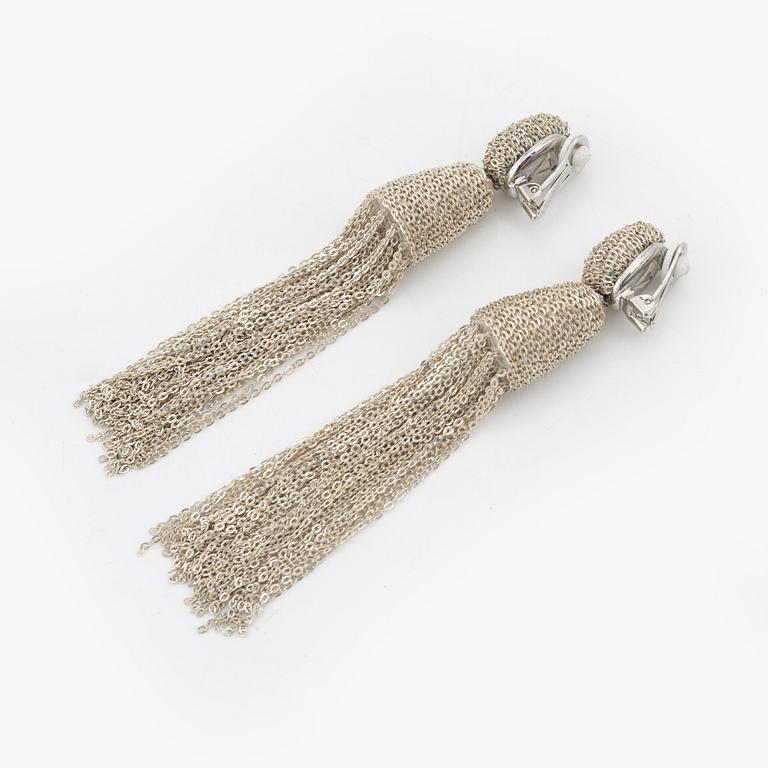 Oscar De La Renta, a pair of clip-on silver chain tassel earrings.