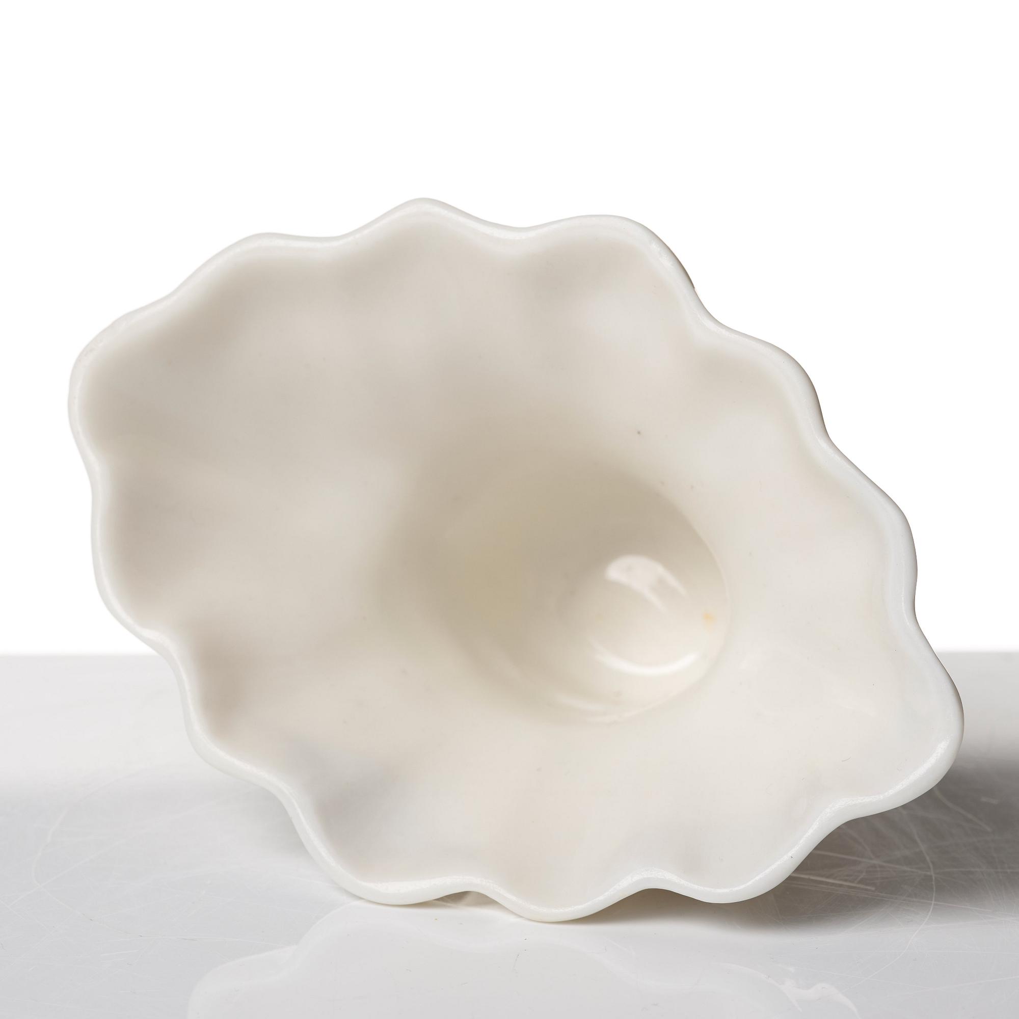 A blanc de chine rhinoserous libation cup, Qing dynasty, Kangxi (1662-1722).