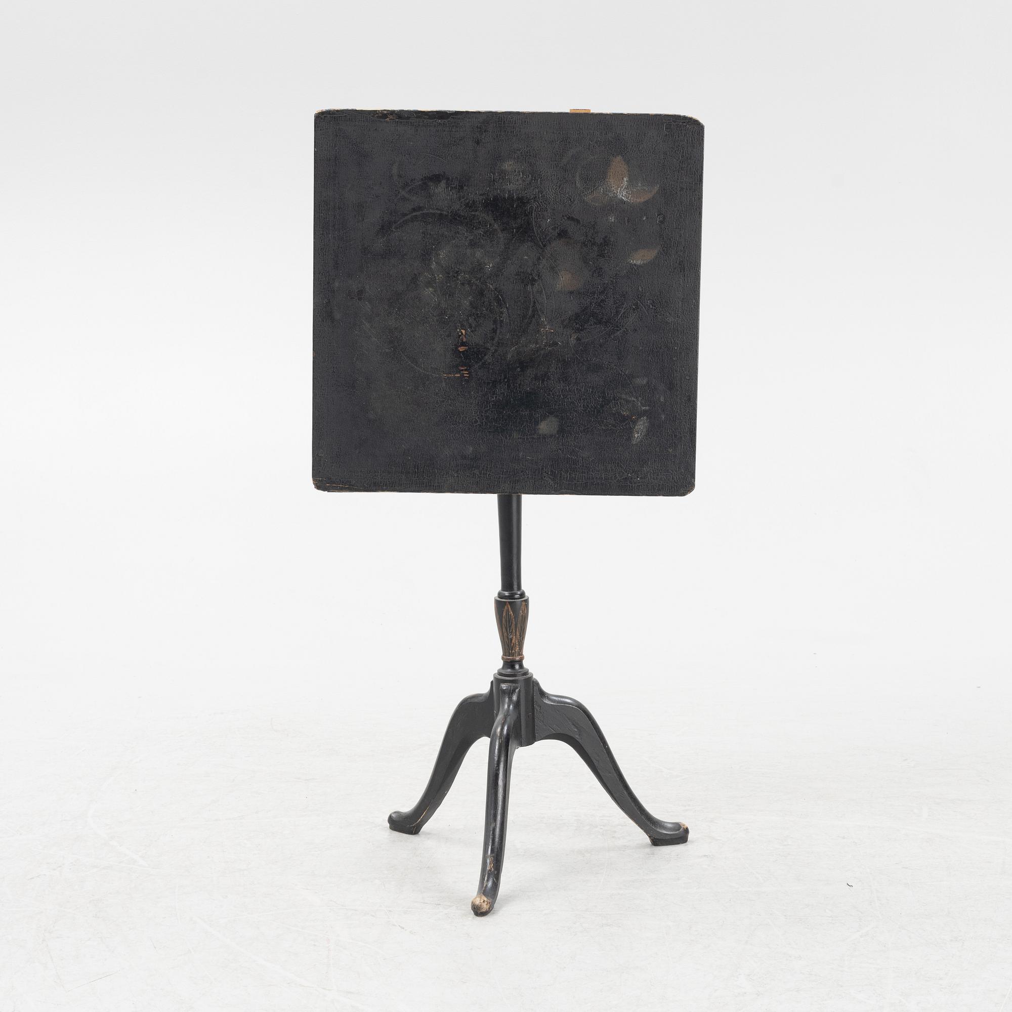 A Swedish tilt top table, from Nils Asplind's workshop signed and dated 1814.