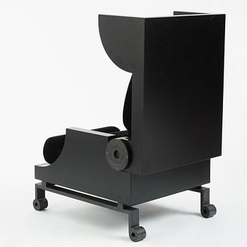 Alexander H Damsbo & Henrik Ingemann Nielsen, a "HC-Andersen Chair" armchair/table, ed. 3/49, Källemo, post 2005.
