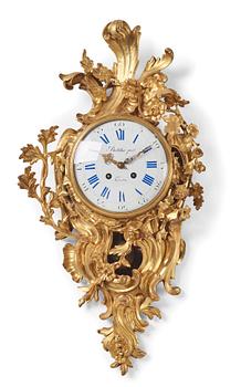 A French Louis XV gilt bronze clock marked Balthazard Paris.