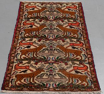 A rug, Old Persian figural, ca 190 x 82 cm.