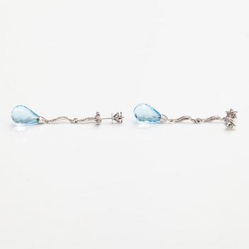 A pair of 18K white gold earrings with topazes and diamonds ca. 0.37 ct in total.