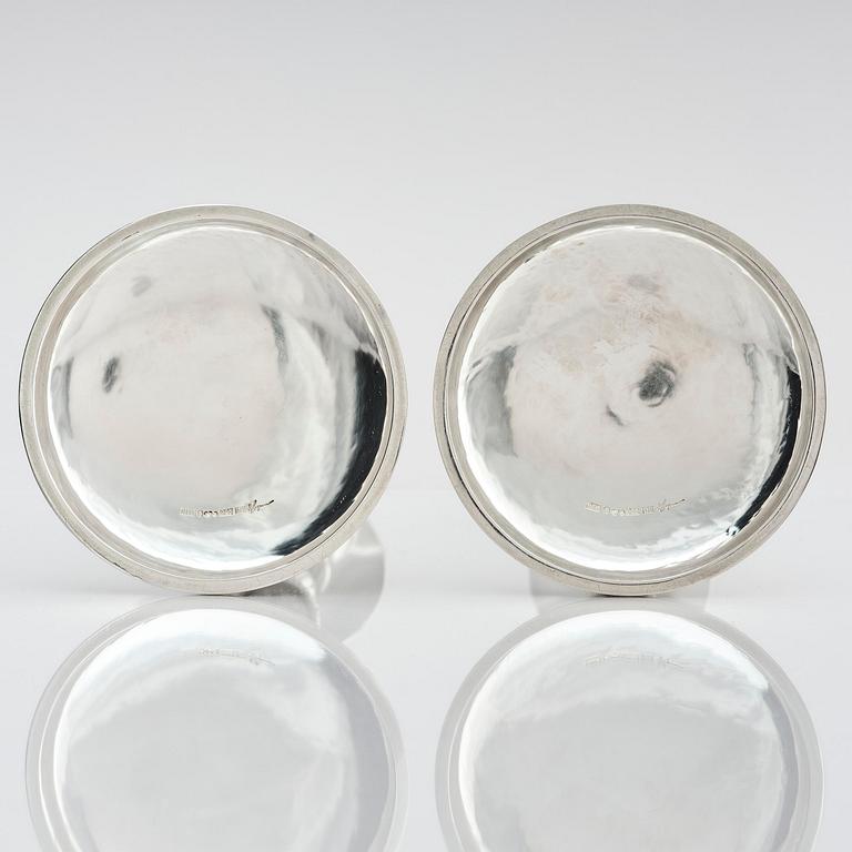 Henrik Ingemansson, a pair of sterling silver and Älvdal porphyry candelsticks, Ingemansson's Smithy, Stockholm, 2002.