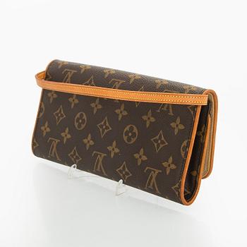 Louis Vuitton, a 'Pochette Twin GM' bag.