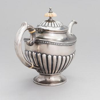 A Russian silver teapot, mark of Ljubavin under the Imperial warrant mark, Swedish control marks.