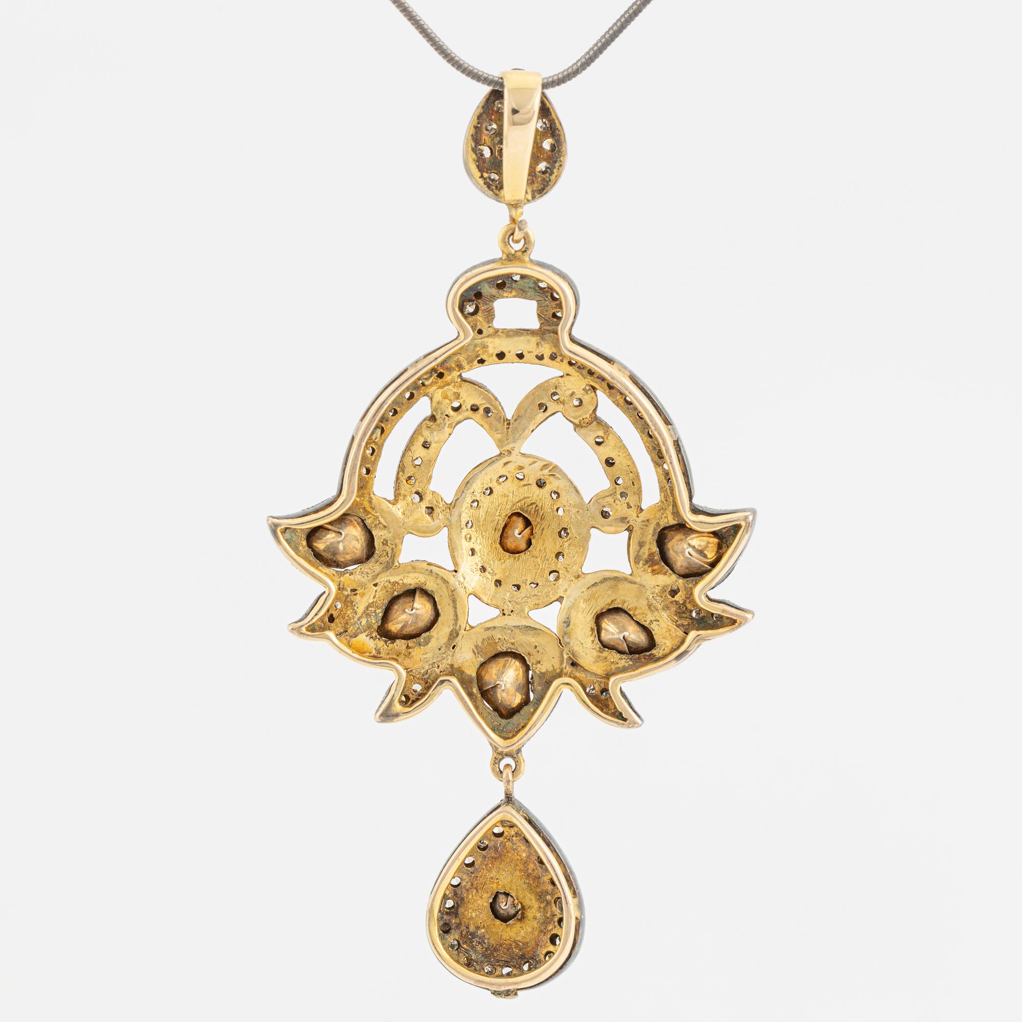 A faceted diamond necklace.