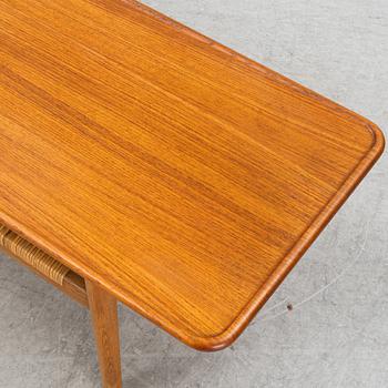 An oak and tek coffee table by Hans J Wegner for Andreas Tuck, 1960s.