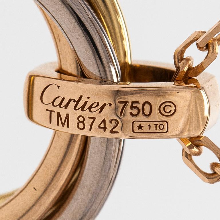 Cartier, an 18K gold 'Trinity Pendant' necklace with brilliant-cut diamonds.