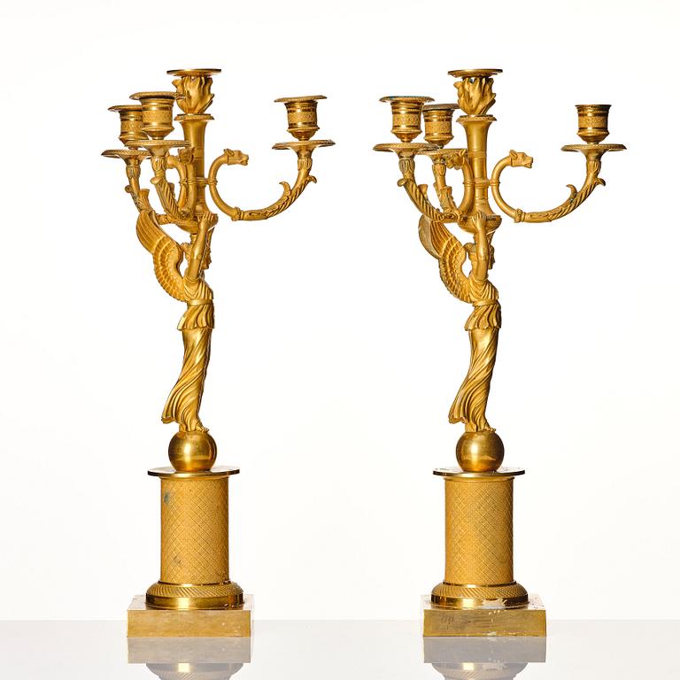 A pair of Empire candelabras for four lights, beginning of the 19th century.