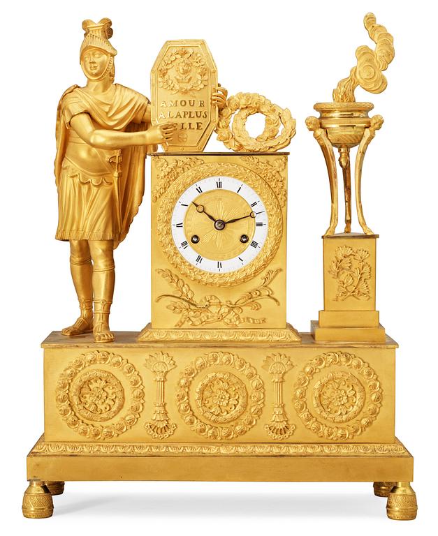 A French Empire early 19th century gilt bronze mantel clock.