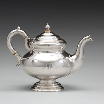 A Russian mid 19th century parcel-gilt tea-pot, mark of Michael Peippo, St Petersburg 1859.