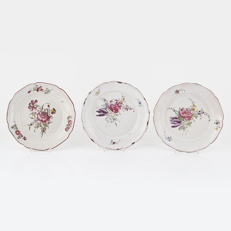 Five earthenware plates, presumably France, 18th century.