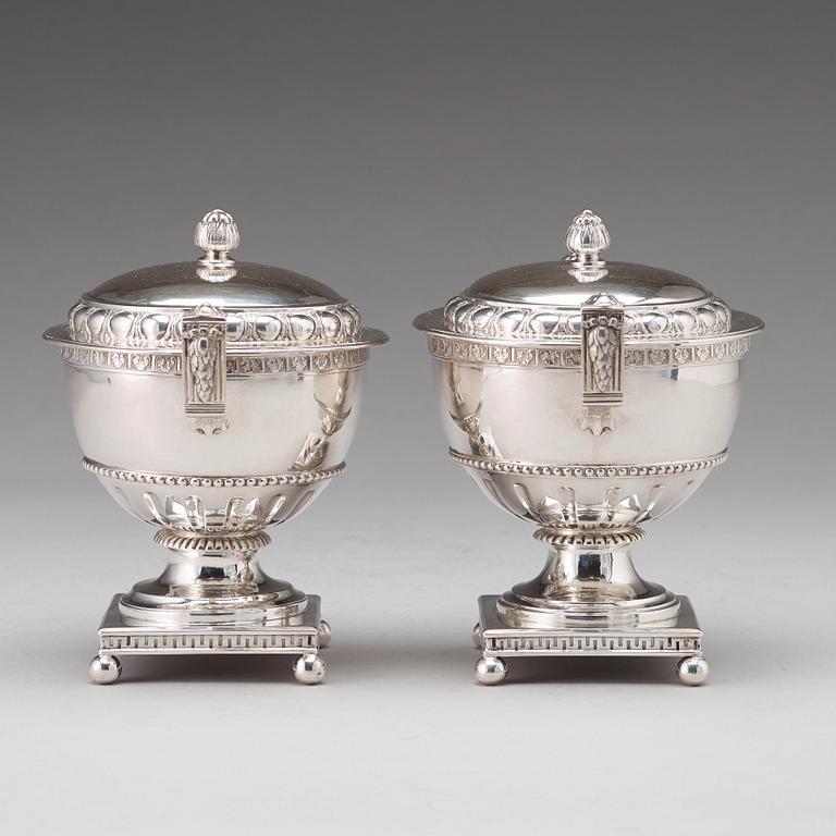 A pair of Swedish late 18th century silver sugar bowls and covers, mark of Pehr Zethelius, Stockholm 1780 and 1781.