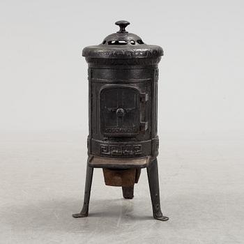 a cast iron stove by Husqvarna on the first half of the 20th century.