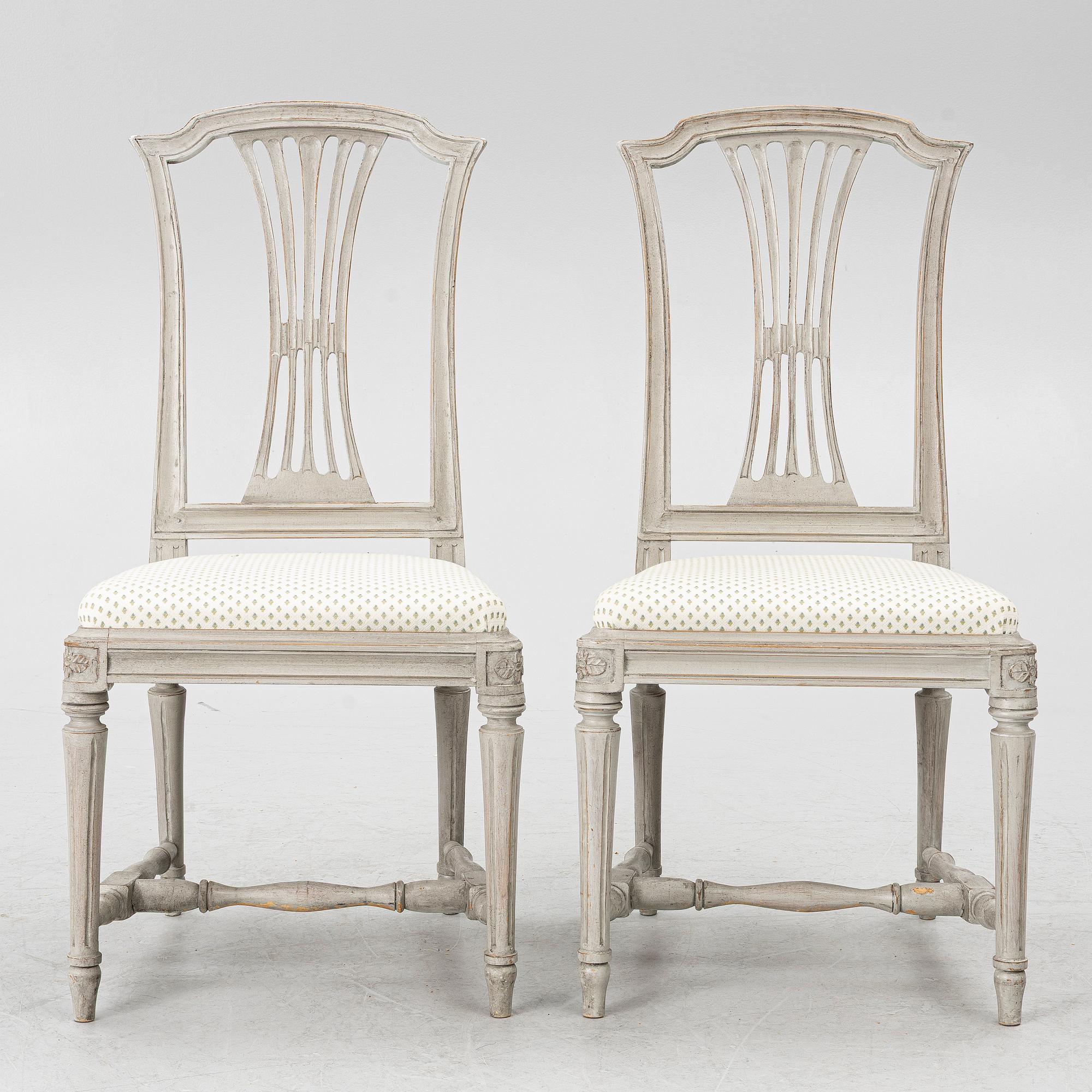 A pair of Gustavian style chairs, early 20th Century.
