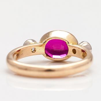 An 18K gold ring with a synthetic ruby and diamonds ca  0.22 ct in total. Lappi & K:ni, Lappeenranta 1925.