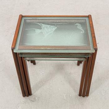 A 1950s mahogany nesting table.