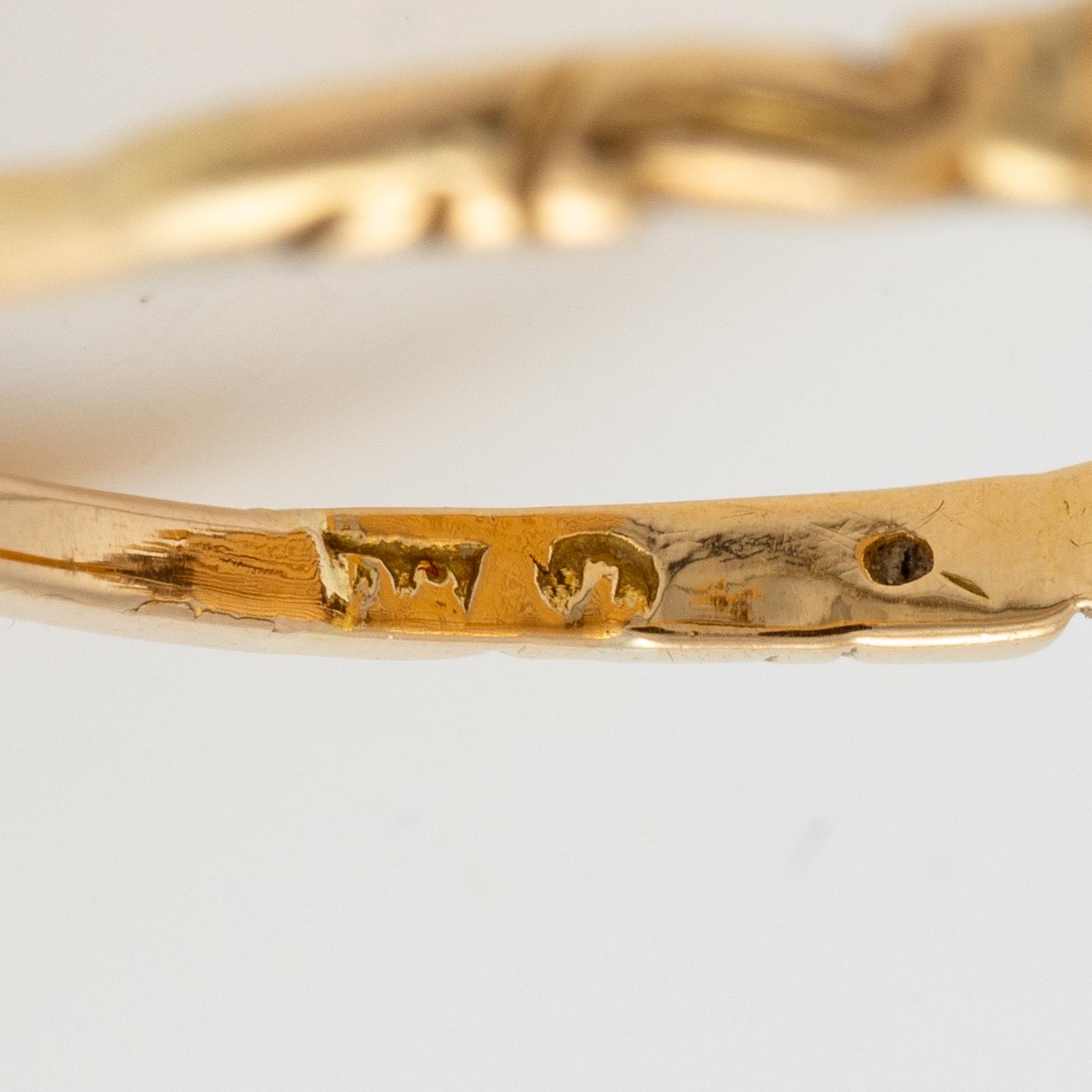 Ring, oval shape, 18K gold with black enamel and rose-cut diamond, 19th century.