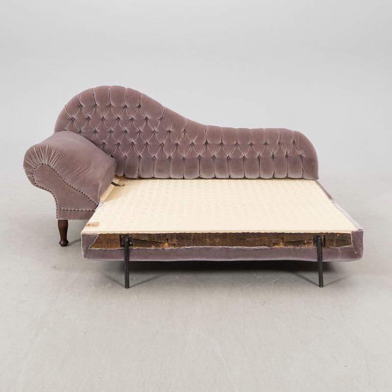 An early 1900s sofa/guest bed.