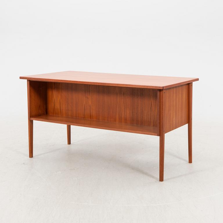 A 1950/60s teak desk.