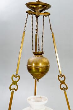 A Jugend brass celing paraffin lamp.