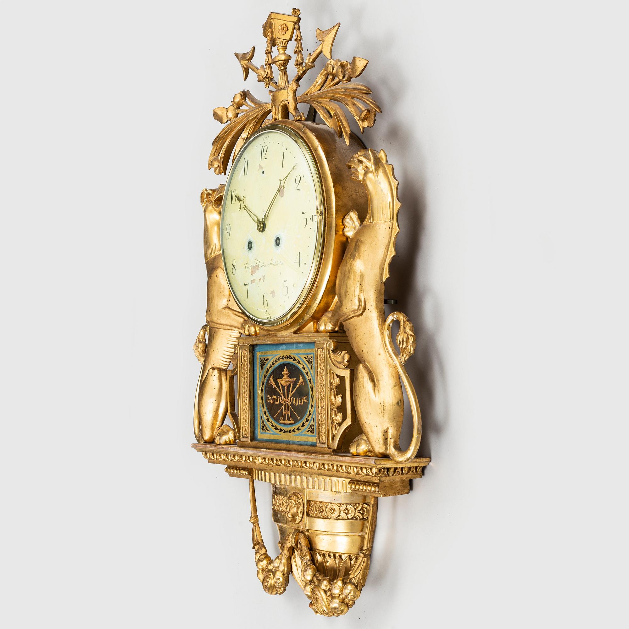 A Swedish Empire wall clock by G Undén (Stockholm 1800-1829).