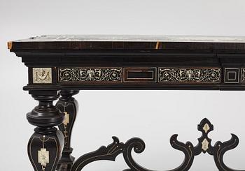 A Renaissance-style ebony, ebonized and ivory-inlaid library table, late 19th century, presumably Germany.