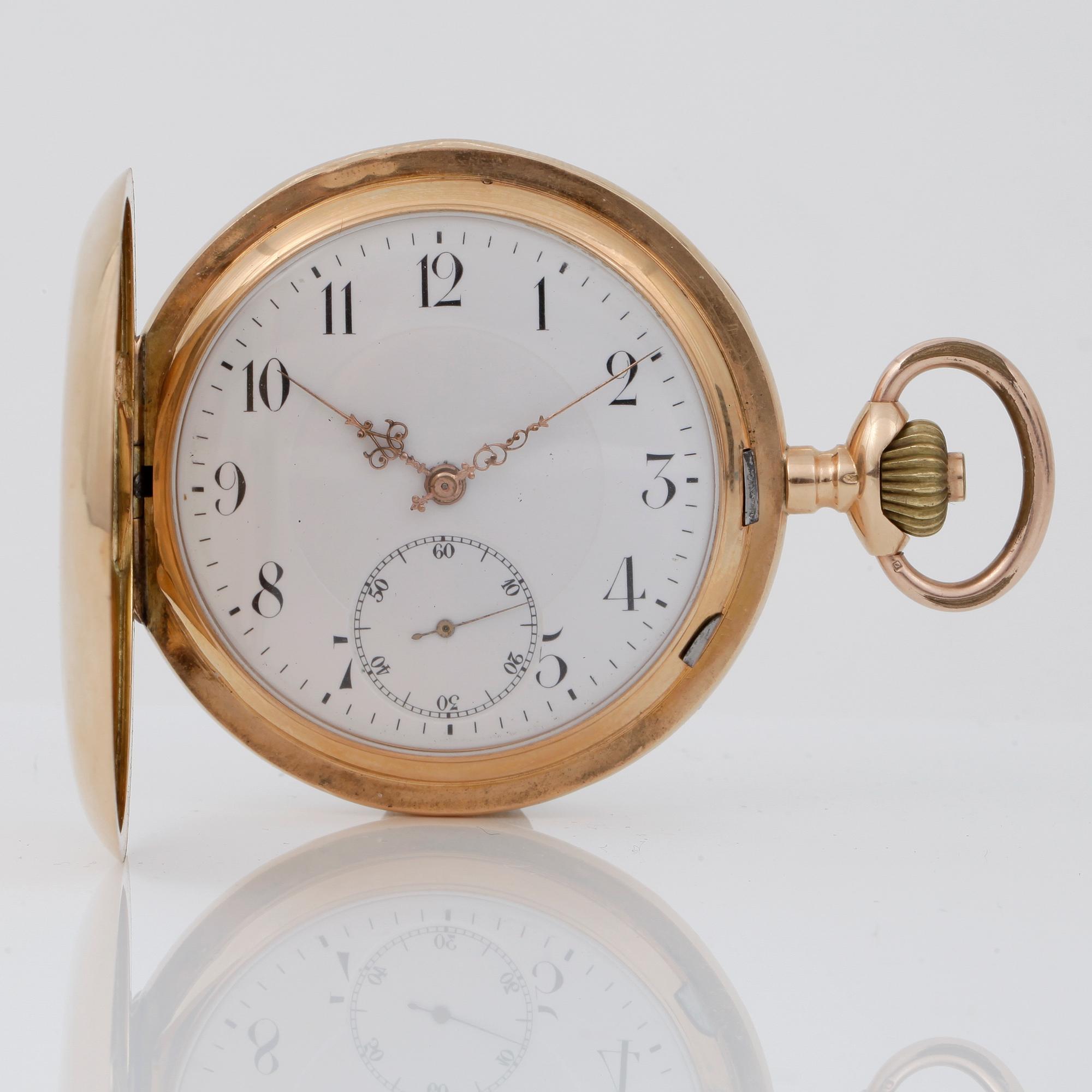 FICKUR, boett i 18K guld. 1900-talets första hälft. Vikt totalt ca 95,6 gram.