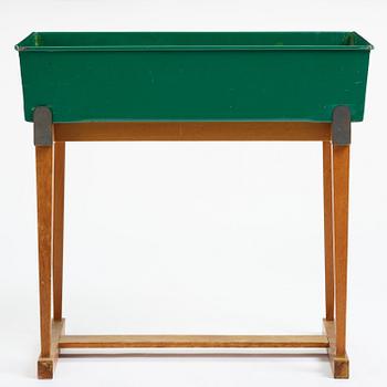 Josef Frank, a rare flower table with green lacquered box model "B 2084", Firma Svenskt Tenn, Sweden, 1950-60s.