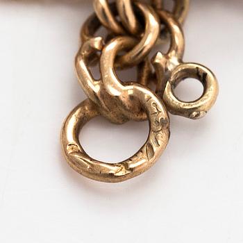 Armband, bismarck ked, 14K guld, med berlocker i form av ägg, Finska stämplar.