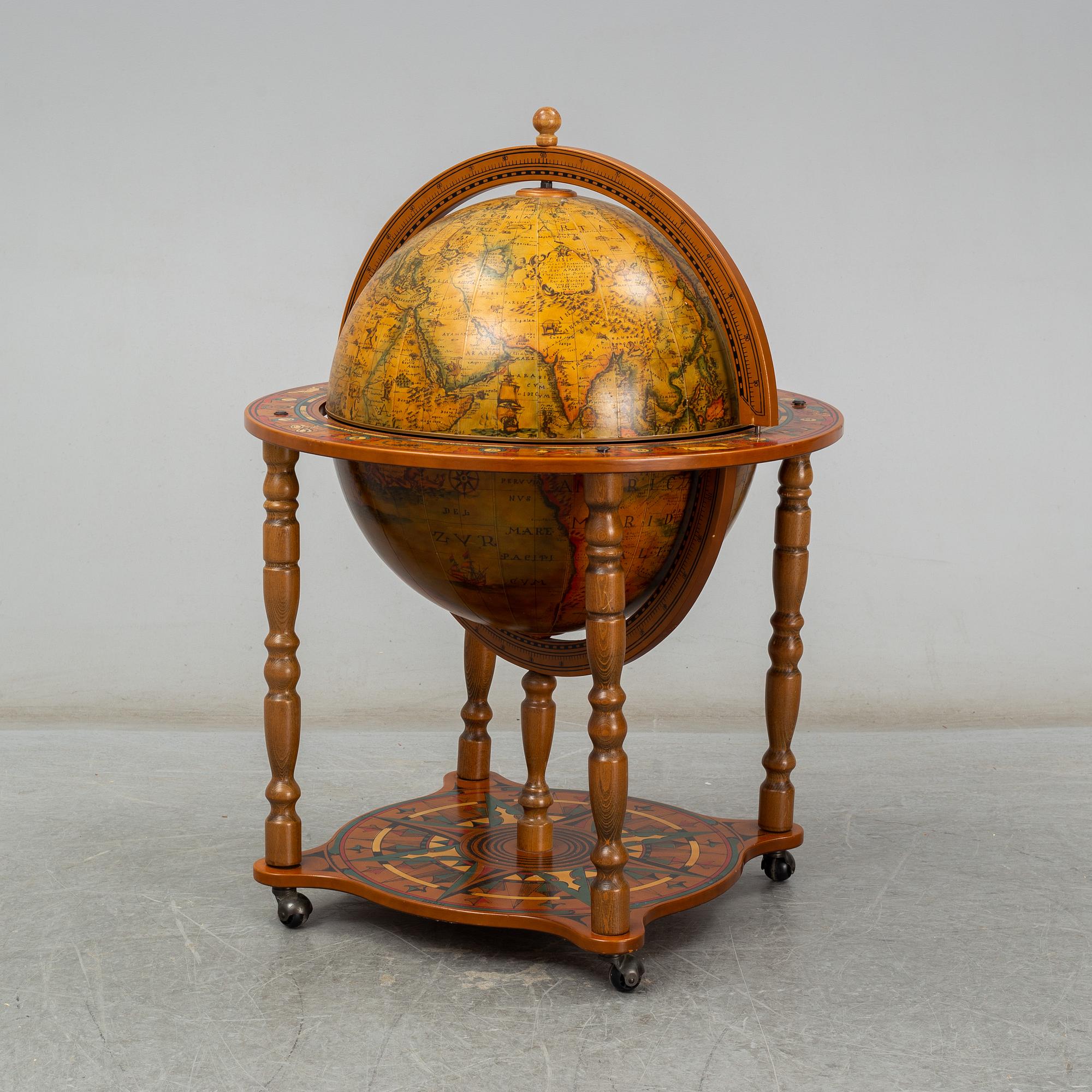 A globe drinks cabinet, late 20th Century.