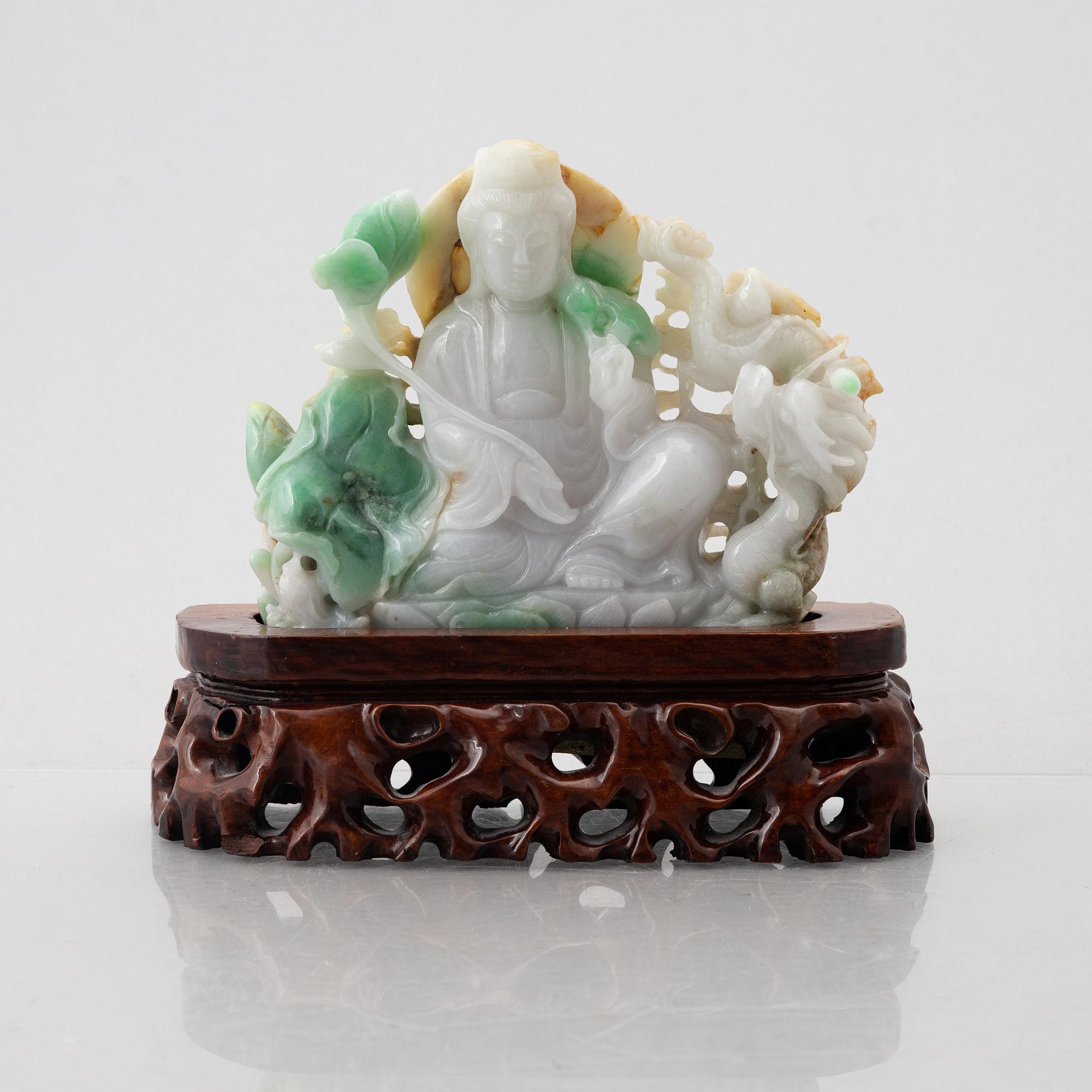 A Chinese stone figure of a Guanyin, later part of the 20th century.