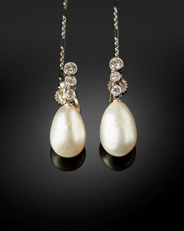 A pair of natural drop-shaped saltwater pearl and old-cut diamond earrings. Length of pearls circa 14 - 14.5 mm.