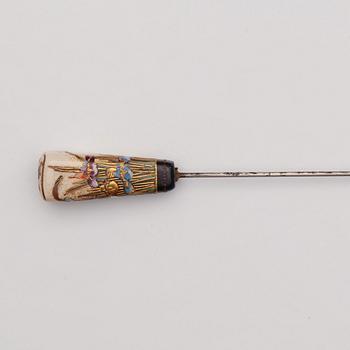 A Japanese painted hat pin, Meiji (1868-1912).
