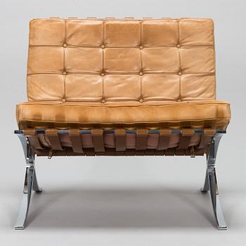 A Ludwig Mies van der Rohe "Barcelona" chair.