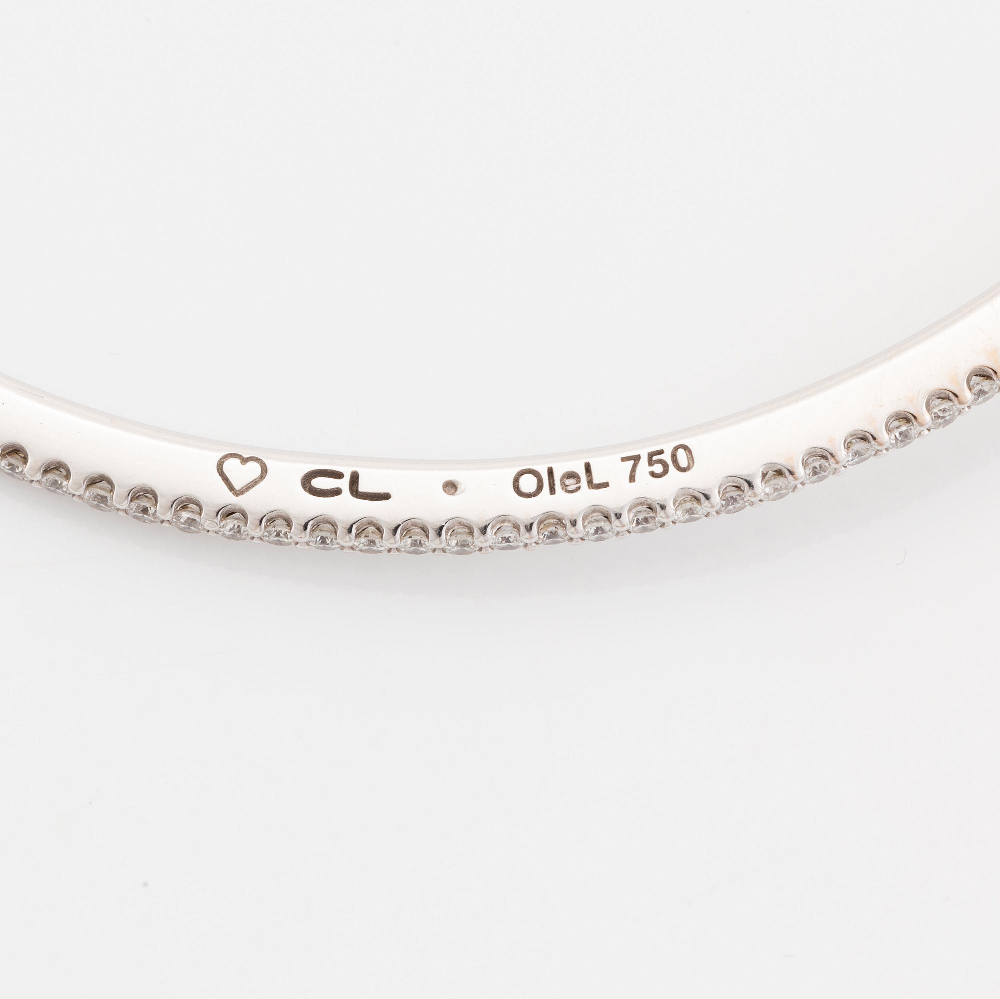 An Ole Lynggaard 18K white gold "Love" bangle set with round brilliant-cut diamonds, design Charlotte Lynggaard.