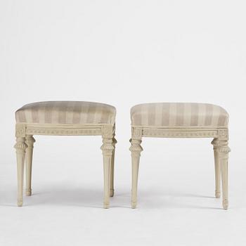 A pair of late Gustavian stools by J. E. Höglander (master in Stockholm 1777-1813).