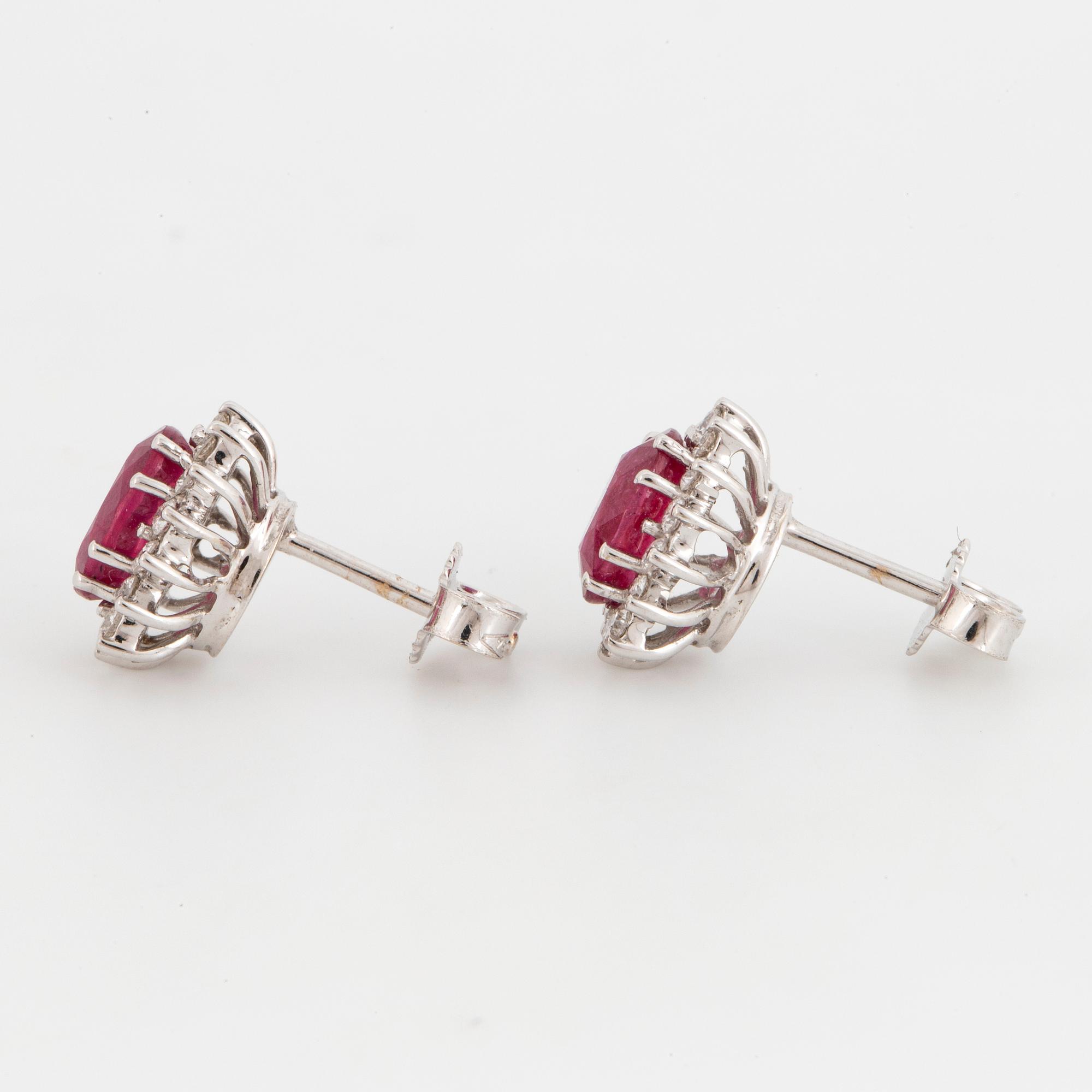 Ruby and brilliant-cut diamond earrings.